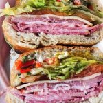 An image of Bay Cities' Godmother sandwich featuring meats from RC Provision